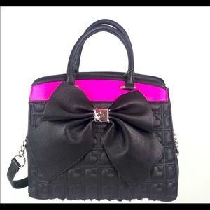 BOW SATCHEL HAS HANDLES AND LONG SHOULDER STRAP *contents not included